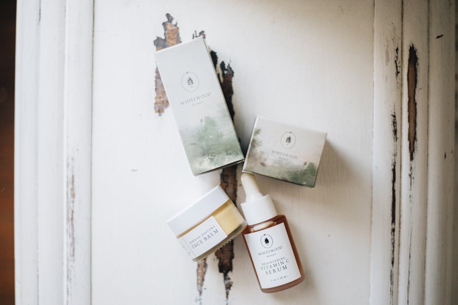 Flat lay of organic skincare items on a rustic surface, emphasizing natural beauty and minimalism.