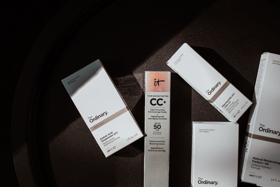 Elegant flat lay of skincare products in soft lighting.