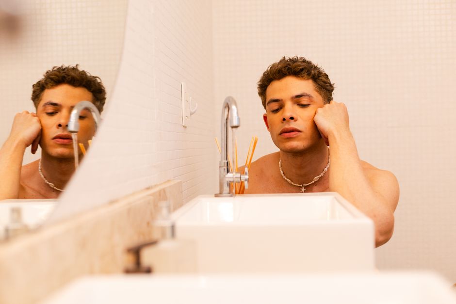 Artistic bathroom portrait reflecting contemplation and mood.